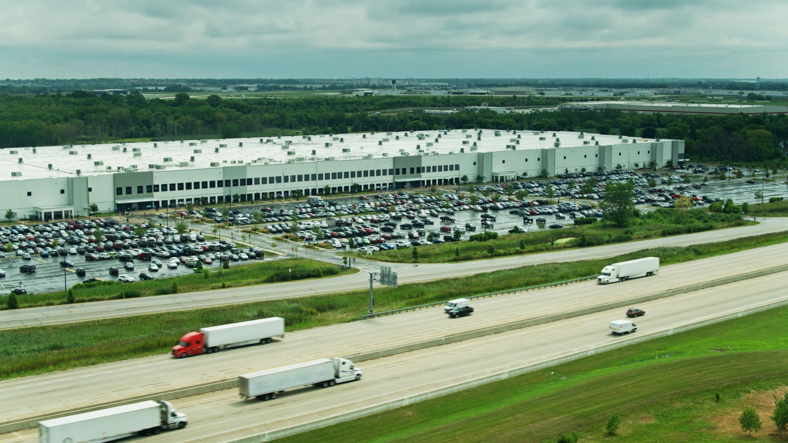 Aerial view of a distribution center near a highway