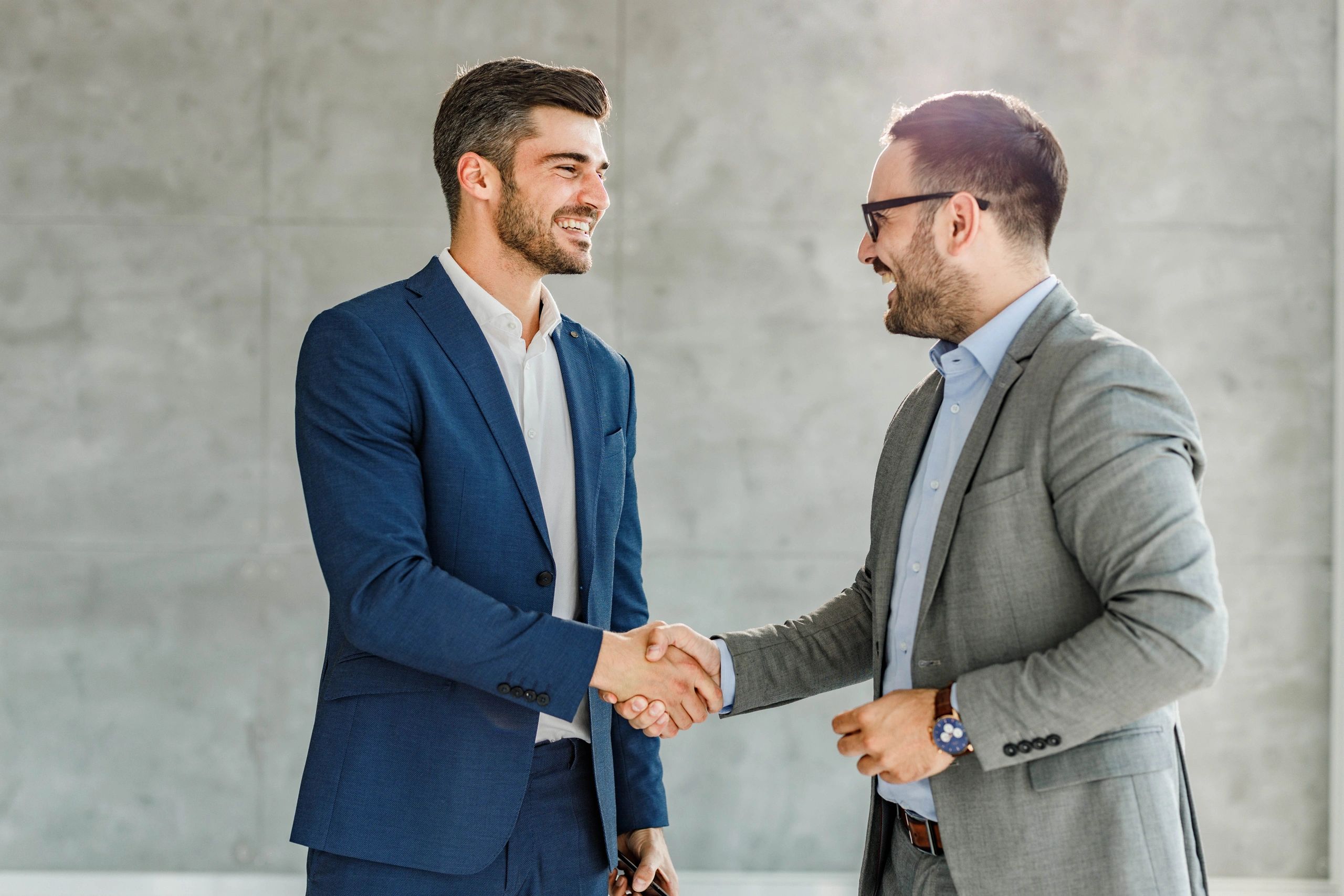 Business partner handshake representing trusted service