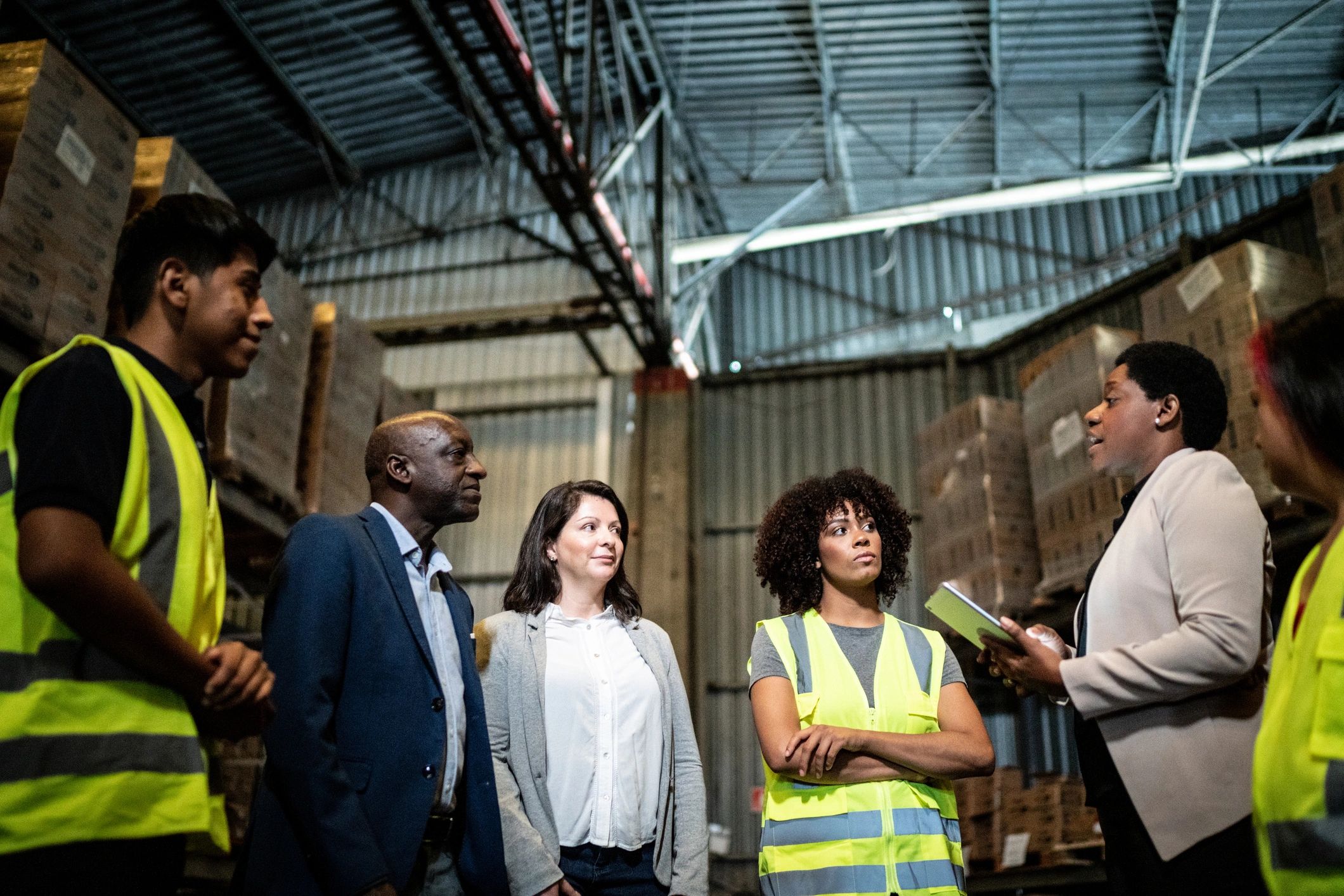 Team meeting in a warehouse