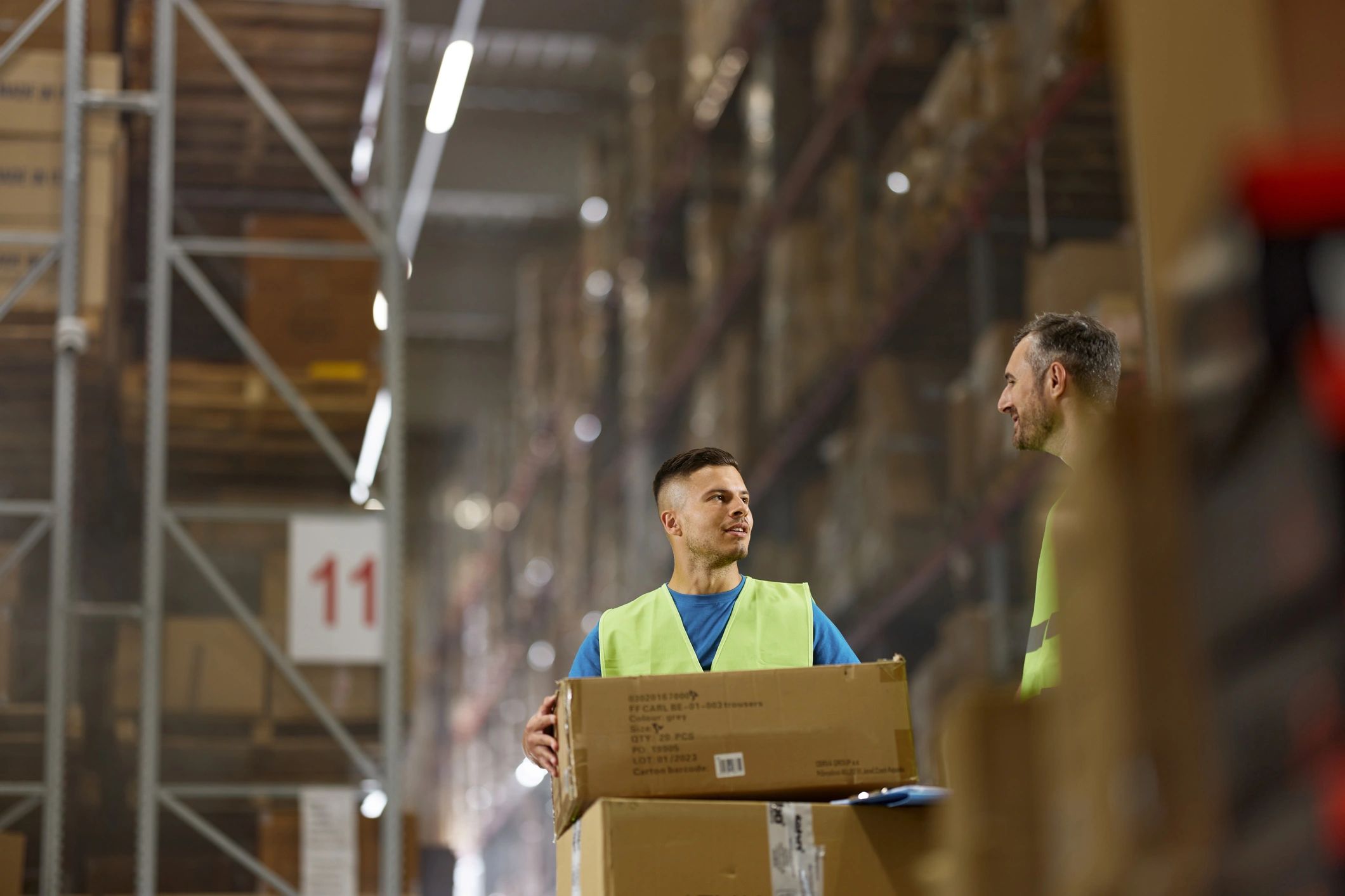 Team members coordinating in a distribution warehouse